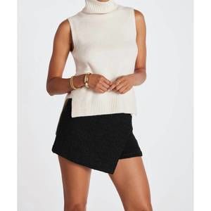 NEW BISHOP + YOUNG frankie sleeveless turtleneck sweater in ivory